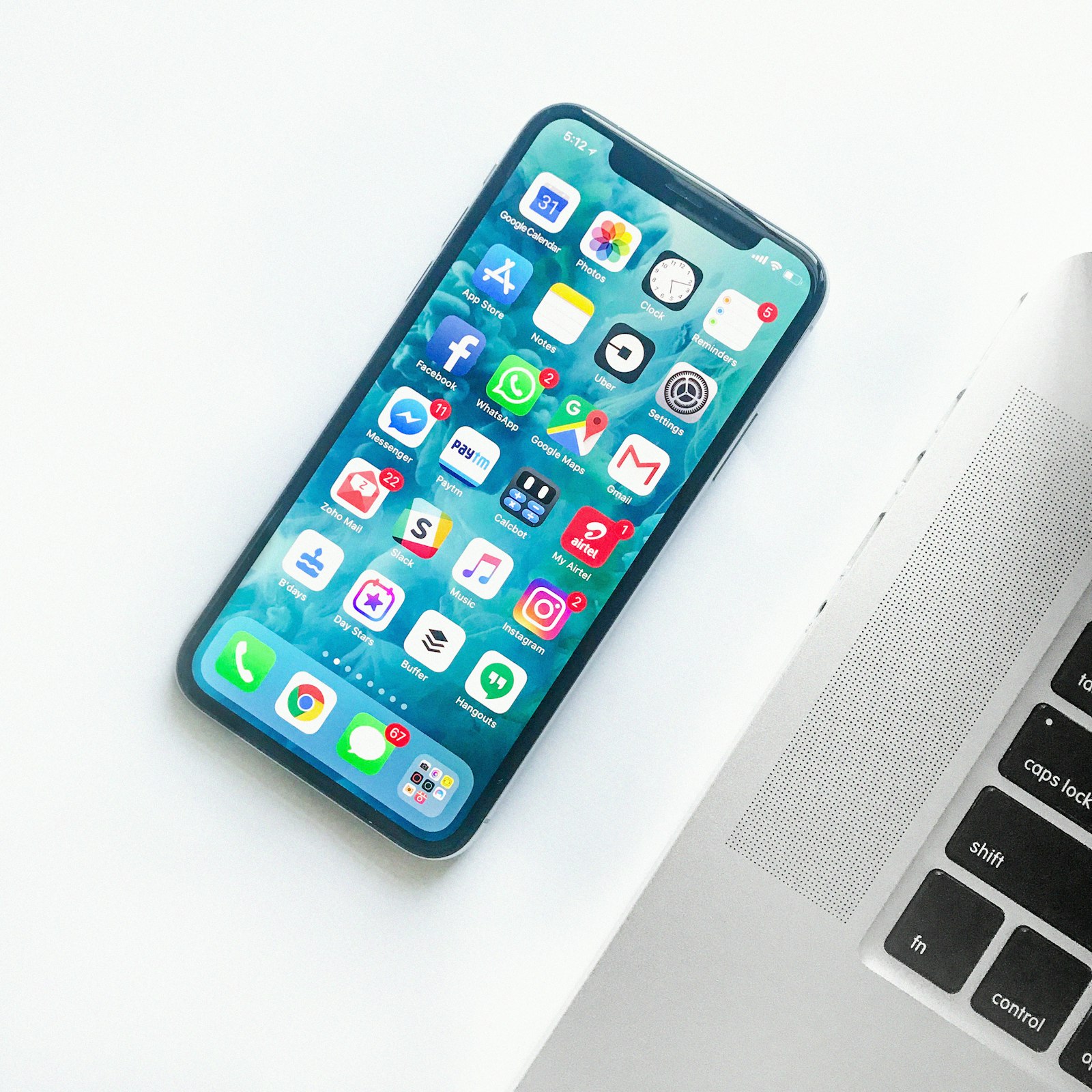 A phone on a desk — the daily driver we actually test